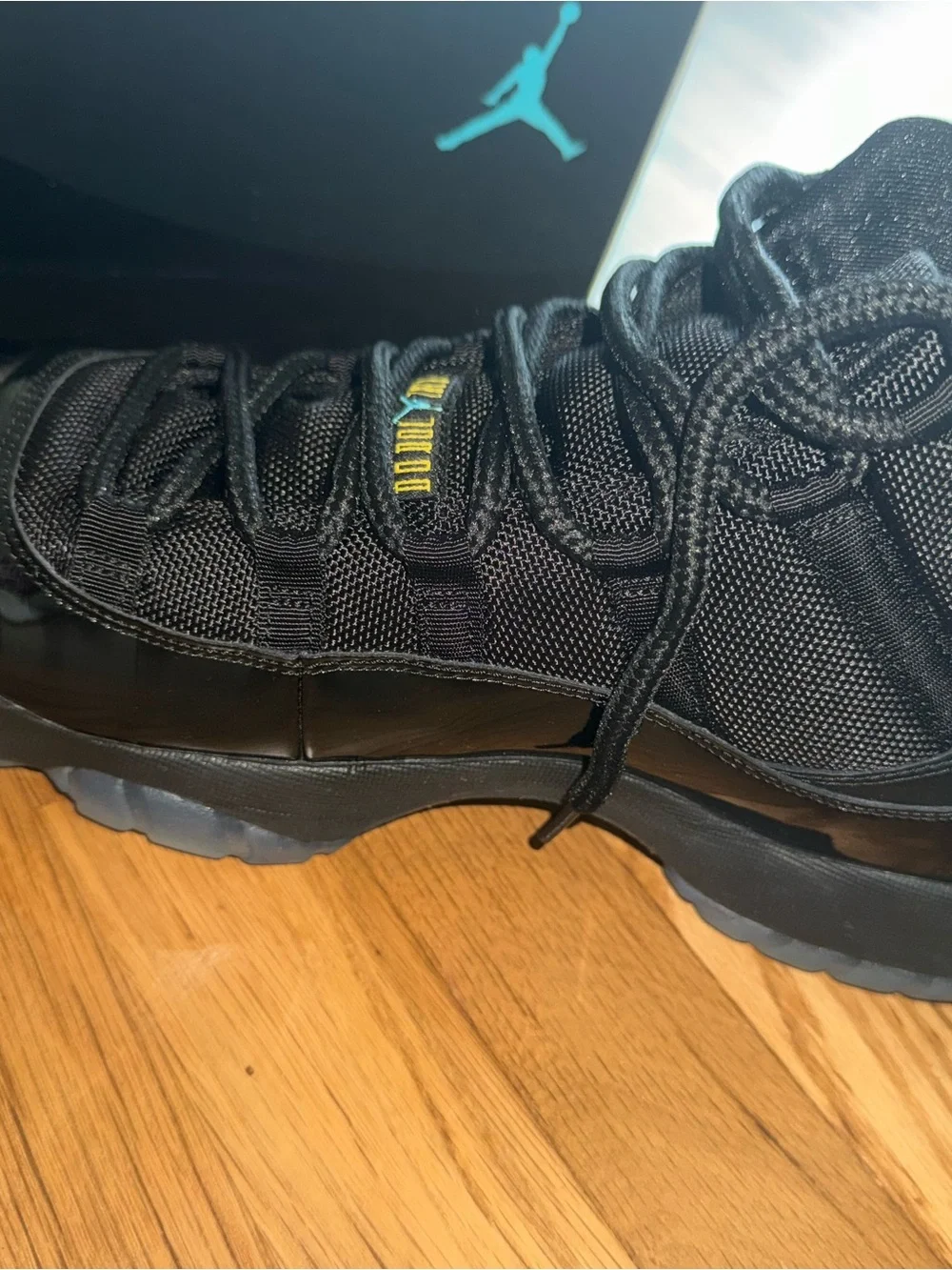 Jordan Retro 11 Athletic Shoes - Black with Teal Accents